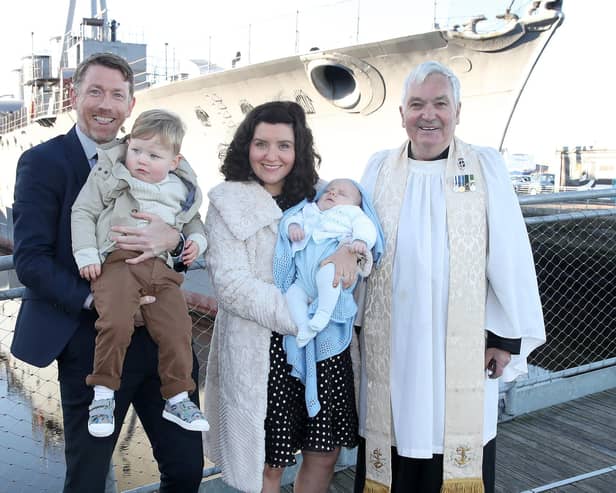 Paul Dickson with wife Lucy and children Finn and Jude, along with Reverend Desmond Hanna after Sunday's christening