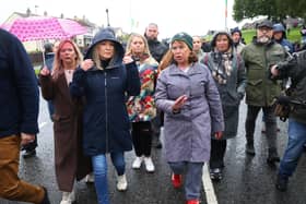 First Minister Michelle O'Neill (centre left) and Sinn Fein president Mary Lou McDonald (centre right) at the Garvaghy road ahead of a Portadown District Loyal Orange Lodge (LOL) No 1 march in the first parade along the Garvaghy Road in Portadown for almost 30 years, after the parade was given clearance in a late-night hearing.