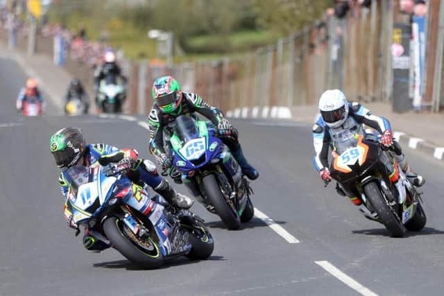 Dominic Herbertson (Burrows/RK Yamaha) leads Michael Sweeney (EM Building Yamaha) and Darryl Tweed (M&D Honda) in the Supersport race at the Cookstown 100