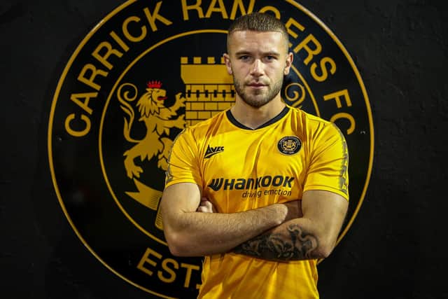 Lewis MacKinnon has joined Carrick Rangers following his release from Rangers