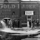 February 1920:  33,100 gallons of wine being flushed into the gutter outside the North Cucamonga Winery in Los Angeles at the start of the National Prohibition on intoxicating drink.  (Photo by Topical Press Agency/Getty Images)