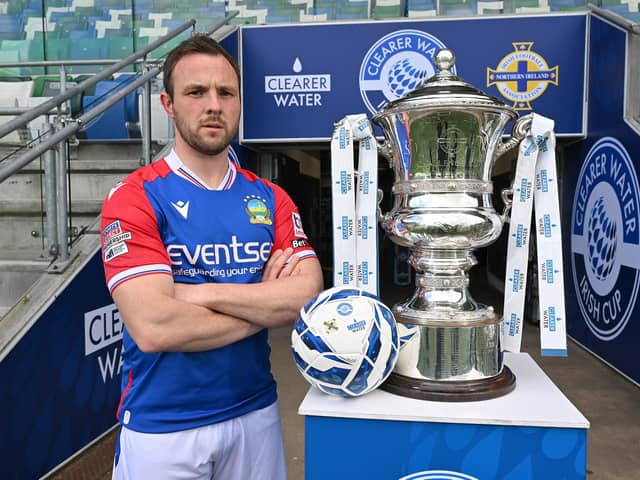 Linfield’s Jamie Mulgrew with the Irish Cup trophy ahead of today's final against Cliftonville at Windsor Park. PIC: Stephen Hamilton/Presseye