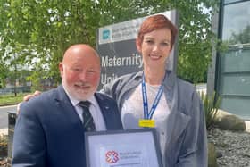 John McCalister presents the Hazel McCalister Exceptional Midwife Award to Ulster Hospital midwifery sister, Julie Dunlop