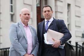 Patrick Thompson (left) pictured outside the High Court in Belfast where his conviction for the murder of four British soldiers in the 1970s was overturned.  Mr Thompson is pictured with his solicitor Pádraig Ó Muirigh.