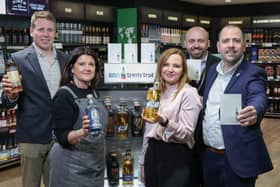Ross Strathearn from Aelia Duty Free, Gary Quade from Tourism NI + representatives from distilleries