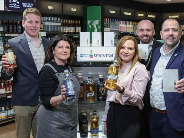 Ross Strathearn from Aelia Duty Free, Gary Quade from Tourism NI + representatives from distilleries