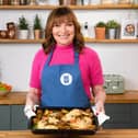WeightWatchers ambassador Lorraine Kelly with the traybake Sunday roast made during a cook along with chef Zena Kamgaing.