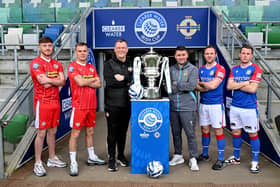 Cliftonville’s Sean Stewart, Rory Hale and Jim Magilton with Linfield’s David Healy, Jamie Mulgrew and Kyle McClean ahead of Saturday's Irish Cup final. PIC: Stephen Hamilton/Presseye