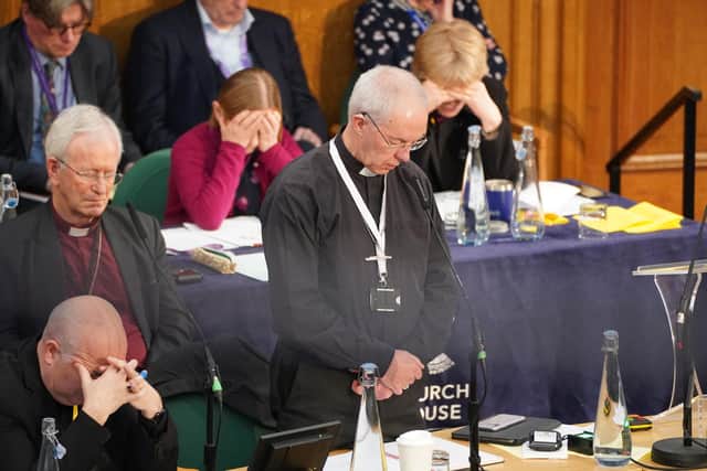 The Archbishop of Canterbury, Justin Welby, says a prayer during the General Synod of the Church of England, at Church House in central London, where members voted in favour of offering blessings to same-sex couples in civil partnerships and marriages.