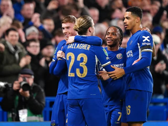 Chelsea's Cole Palmer (left) celebrates scoring his side's fifth goal in the Carabao Cup semi final against Middlesbrough at Stamford Bridge