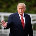 US President Donald Trump departs from Aras an Uachtarain, after his meeting with President Catherine Connolly at her official residence in Phoenix Park, Dublin, during his trip to the Republic of Ireland