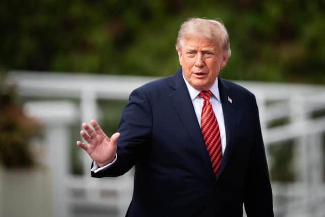 US President Donald Trump departs from Aras an Uachtarain, after his meeting with President Catherine Connolly at her official residence in Phoenix Park, Dublin, during his trip to the Republic of Ireland