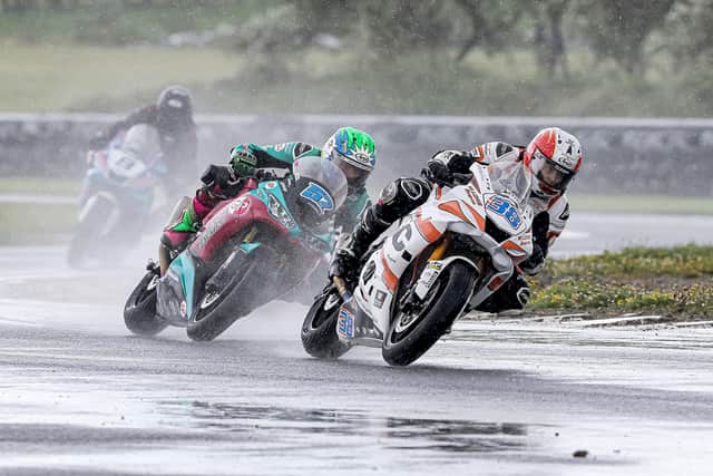 Jason Lynn (J McC Roofing Yamaha) leads eventual winner Korie McGreevy (McAdoo Racing Kawasaki) in the rain at the Neil and Donny Robinson Memorial meeting at Bishopscourt in Co Down. Picture: Derek Wilson/Pacemaker Press