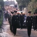 The funeral for John Larmour took place in October 1988