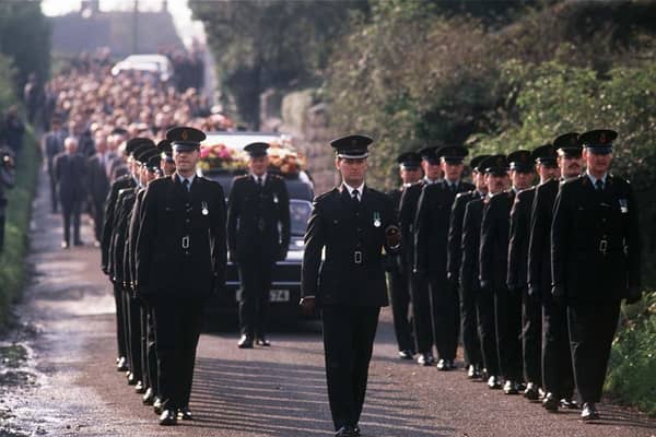 The funeral for John Larmour took place in October 1988