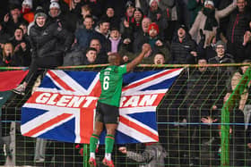 Fuad Sule celebrating after full-time in front of the Glentoran fans following a 2-1 extra-time victory over Linfield at the Oval in the Clearer Water Irish Cup sixth round. (Photo by Andrew McCarroll/Pacemaker Press)