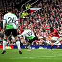 Manchester United's Kobbie Mainoo scores against Liverpool. (Photo by Shaun Botterill/Getty Images)
