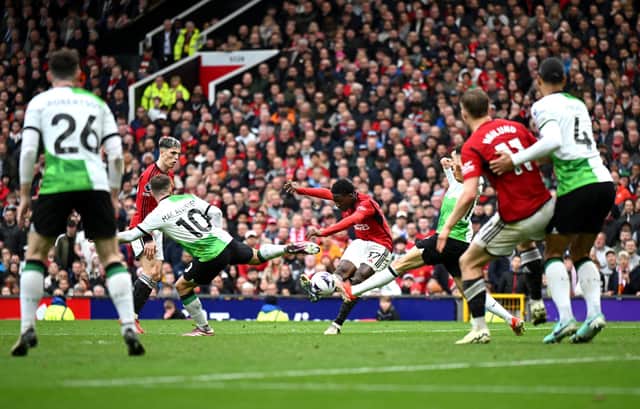 Manchester United's Kobbie Mainoo scores against Liverpool. (Photo by Shaun Botterill/Getty Images)