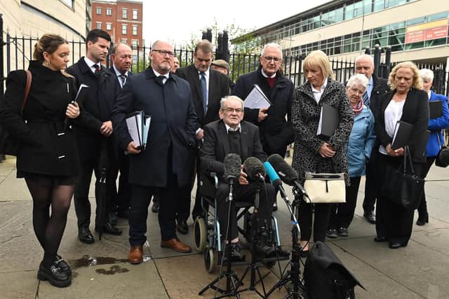 Kingsmill Massacre sole survivor Alan Black (sitting in wheelchair) speaks to the media outside Laganside Courts, Belfast, following the conclusion of the inquest for the victims of the Kingsmill massacre, in which 10 Protestant textile workers were shot dead when their minibus was ambushed outside the village of Kingsmill on their way home from work on January 5 1976. Picture date: Friday April 12, 2024.Photo: Oliver McVeigh/PA Wire