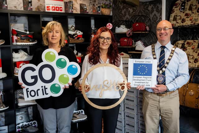 Enniskillen business owner Lisa McElroy has credited a combination of retail experience, encouragement from her young daughter and a ‘Go For It’ attitude in giving her the push to start up her own business. Pictured are Siobhan Colton, Fermanagh Enterprise, Lisa McElroy, MySHoo and councillor Thomas O’Reilly, chair of Fermanagh and Omagh District Council