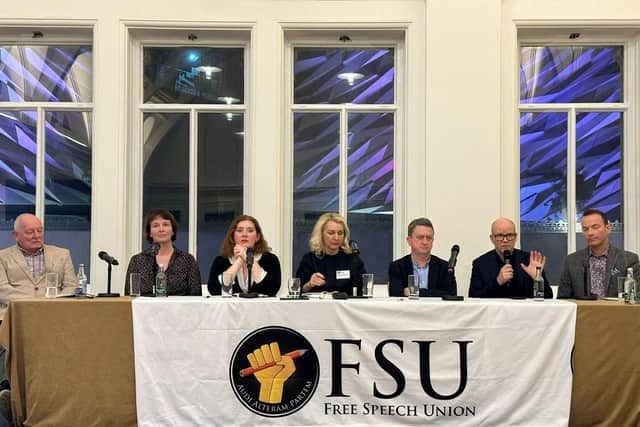 The FSU's gathering in Belfast on Friday night, with Toby Young holding the microphone