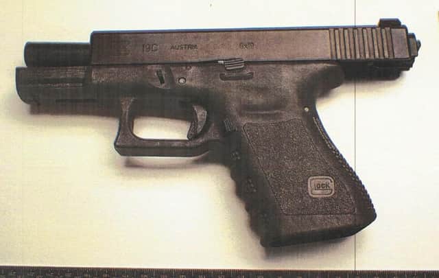Glock pistol found in the South Armagh arms cache. It is clear these guns were republican, as was the case with many during Ross Hussey's time on the Policing Board