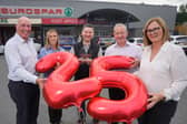 Campbell’s EUROSPAR in Banbridge is marking 25 years in business by celebrating with their local community. Pictured is store owners Brian and Berenice Campbell and store manager Paul McArdle with Paul Deans and Laura McLean from Henderson Group celebrating 25 years of Campbell’s EUROSPAR