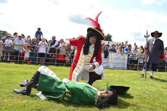 Scarva is renowned for hosting the biggest one-day event, at a single location, anywhere in Northern Ireland as the mock battle between rival monarchs William and James took place this afternoon (July 13)