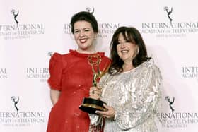 Lisa McGee, left, and Liz Lewin pose in the press room with the Emmy for Best Comedy for "Derry Girls" at the 51st International Emmy Awards at the New York Hilton Midtown on Monday, Nov. 20, 2023, in New York. (Photo by Andy Kropa/Invision/AP)