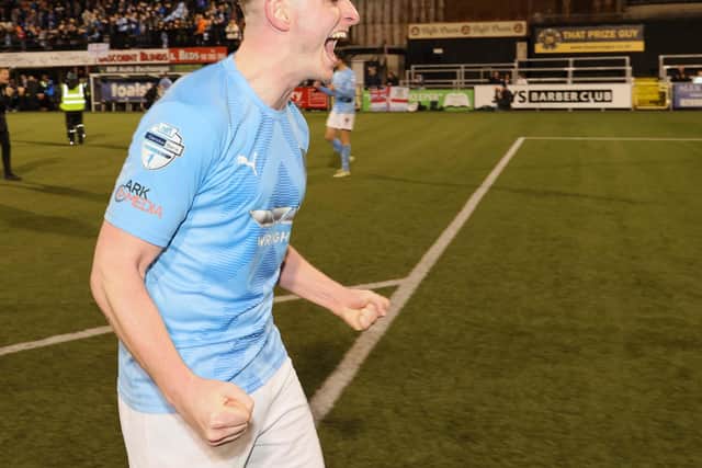 Dougie Wilson celebrates after netting in the Irish Cup semi-final win against Larne at Seaview.