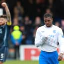 Rangers' Dujon Sterling (right) looks dejected as Ross County's Jack Baldwin celebrates after the final whistle in the cinch Premiership match at the Global Energy Stadium, Dingwall. (Photo by Steve Welsh/PA Wire).