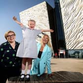 Titanic Belfast has announced the introduction of a new School Transport Bursary to give schools in some of Northern Ireland’s most deprived areas the opportunity to apply for free transport to support them when visiting the world-leading attraction in the 2023/24 academic year. Pictured are Caroline McComb, director of McComb’s Coach Travel, Judith Owens MBE, chief executive of Titanic Belfast and local school pupil Zoe Kennedy