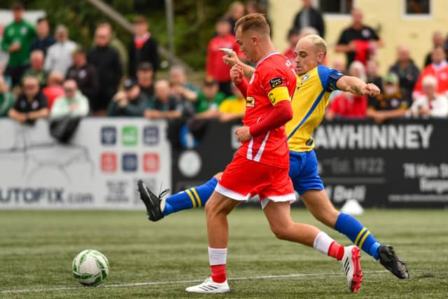 Bangor's Reece Neale in action against Cliftonville earlier this season. (Photo by Andrew McCarroll/Pacemaker Press)