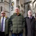 Mark Tipper (left), brother of Trooper Simon Tipper who was killed in the 1982 IRA Hyde Park bomb, Simon Utley (middle) survivor of the Hyde Park bomb with Paul Young (right), spokesman for the Northern Ireland Veterans Movement, at the High Court in London, where a judge has begun overseeing a preliminary hearing in a case in which survivors of the 1973 Old Bailey bombing, the 1996 Manchester bombing and the 1996 Docklands bombing have taken legal action against Gerry Adams and the Provisional IRA.
