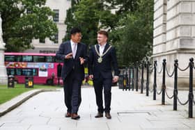 Lord Mayor councillor Ryan Murphy welcomes the vice mayor for Economic Affairs in Sejong, Seung Won Lee, to Belfast