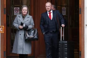 TUV's Ann McClure and legal representative Jamie Bryson pictured leaving the court after an earlier hearing