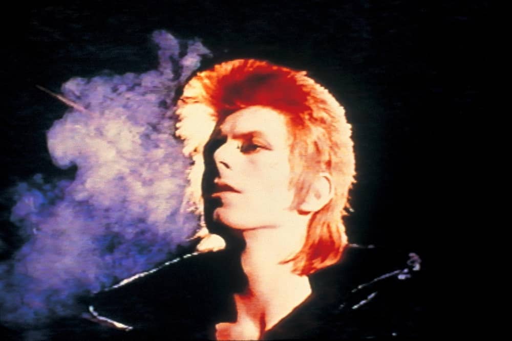 A still of David Bowie in the video for single 'John, I'm Only Dancing'. (c) Mick Rock, 1973, 2026. Courtesy of the Estate of Mick Rock