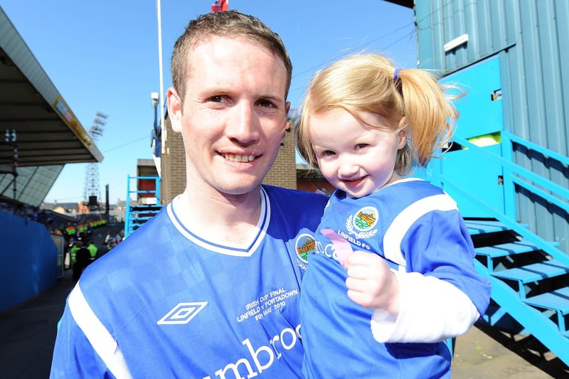 Linfield's JP Gallagher with daughter Ellie after winning the Irish Cup