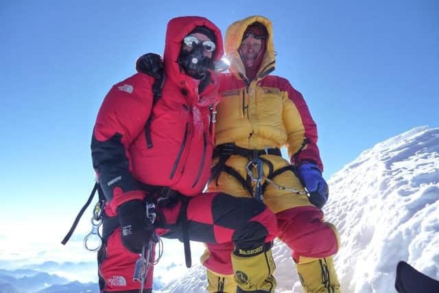 Dromara man Noel Hanna (right) with Dublin man Derek Mahon at the summit of Mount Everest.