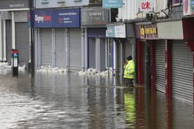 Water levels in Newry receded overnight but on Wednesday morning Sugar Island remained flooded. The owners of flooded businesses in south Down are facing expensive clean-up operations after Newry's canal burst its banks.
Picture By: Arthur Allison: PacemakerPress.