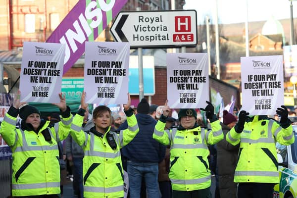 More than 25,000 healthcare staff in Northern Ireland have held a one-day strike as part of a pay dispute.