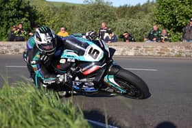 Michael Dunlop, pictured at the Gooseneck, set the fastest lap in opening practice at the Isle of Man TT on the Hawk Racing Honda Superbike at 129.59mph on Monday