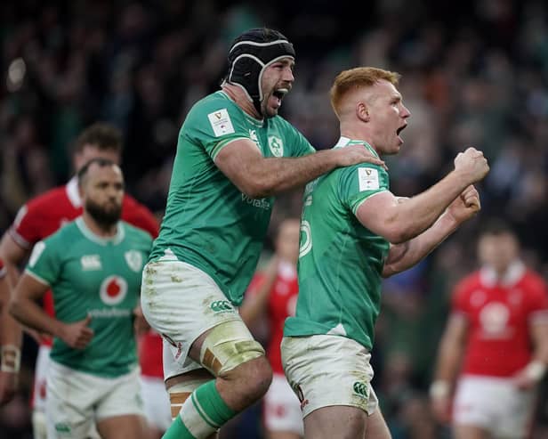 Ireland's Ciaran Frawley (right) celebrates with Caelan Doris after scoring his side's third try during the Guinness Six Nations match at the Aviva Stadium against Wales. (Photo by Niall Carson/PA Wire)