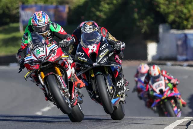 Glenn Irwin (Nitrous Competitions Racing Ducati) leads Storm Stacey (GRYD Racing BMW) at the North West 200 in May. (Photo by David Maginnis/Pacemaker Press)