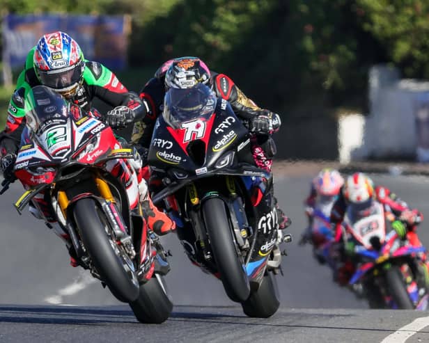 Glenn Irwin (Nitrous Competitions Racing Ducati) leads Storm Stacey (GRYD Racing BMW) at the North West 200 in May.  (Photo by David Maginnis/Pacemaker Press)