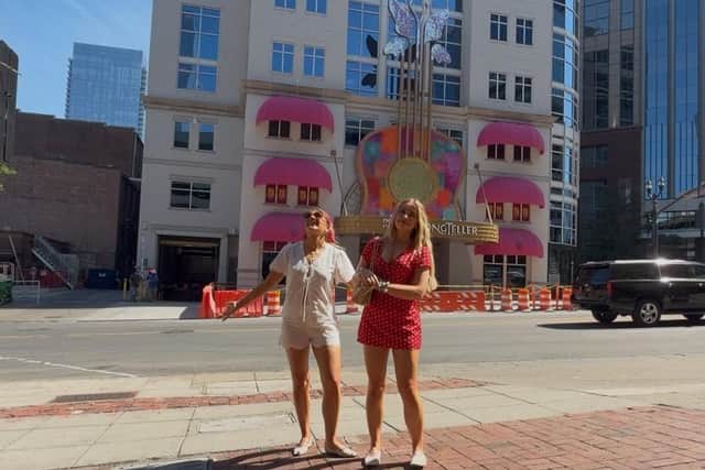 Banbridge girls Beth McDaniel and Ellen Watson pictured outside Dolly Parton's new hotel in Nashville, which is due to open soon.