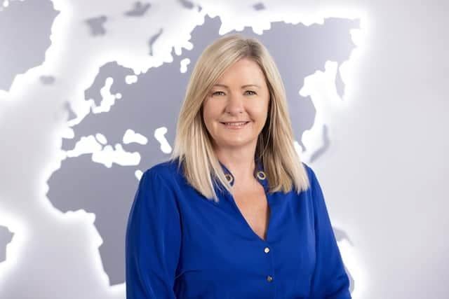 Jacqueline Dobson, President of Barrhead Travel Group, reflects on the company's £1.2m investment in Newtownabbey and its commitment to growth, high street revival, and local community connections