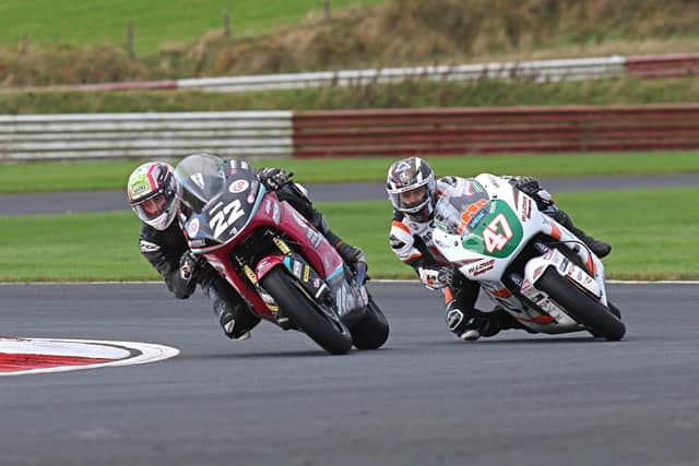 Eunan McGlinchey (McAdoo Kawasaki) edged out Richard Cooper (J McC Roofing/KMR Kawasaki) to win the first Supertwin race but was later disqualified for a 'technical infringement' following an appeal.