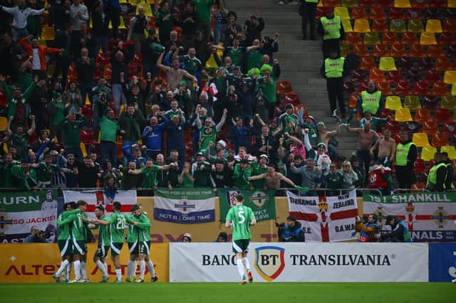Northern Ireland's Jamie Reid celebrates after scoring. PIC: Pacemaker/Raed Krishan