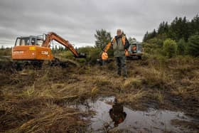 Jon Hill, of the Independent Commission for the Location of Victims' Remains (ICLVR), stands besides excavators at Bragan Bog near Emyvale in Co Monaghan. An urgent appeal for information to find Disappeared victim Columba McVeigh has been made as the latest search for his remains ends. The Co Tyrone teenager was abducted, killed and secretly buried by the Provisional IRA in 1975. Photo: Liam McBurney/PA Wire